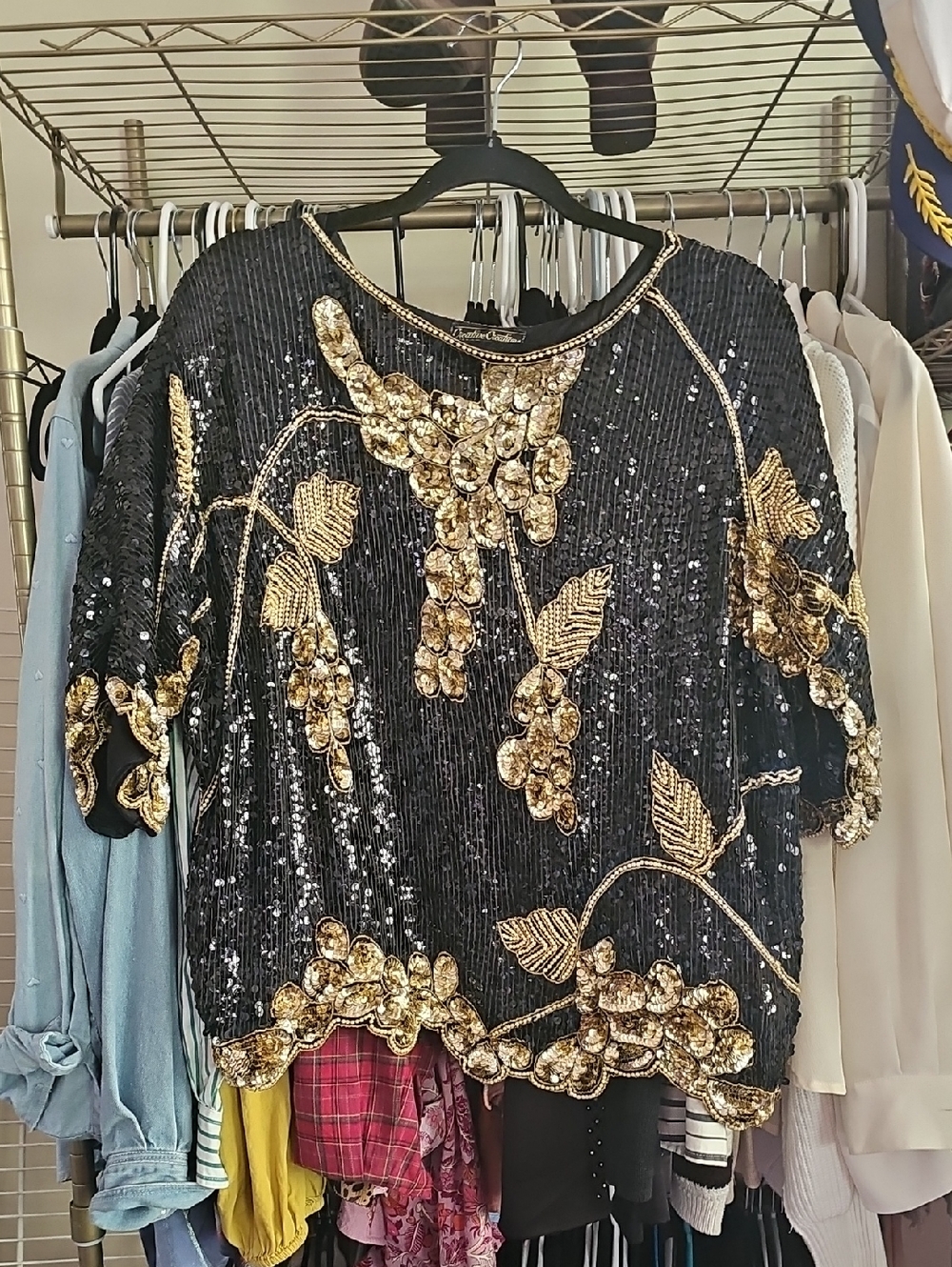 Embellished Black Sequin Sweatshirt with Gold Floral Appliqué